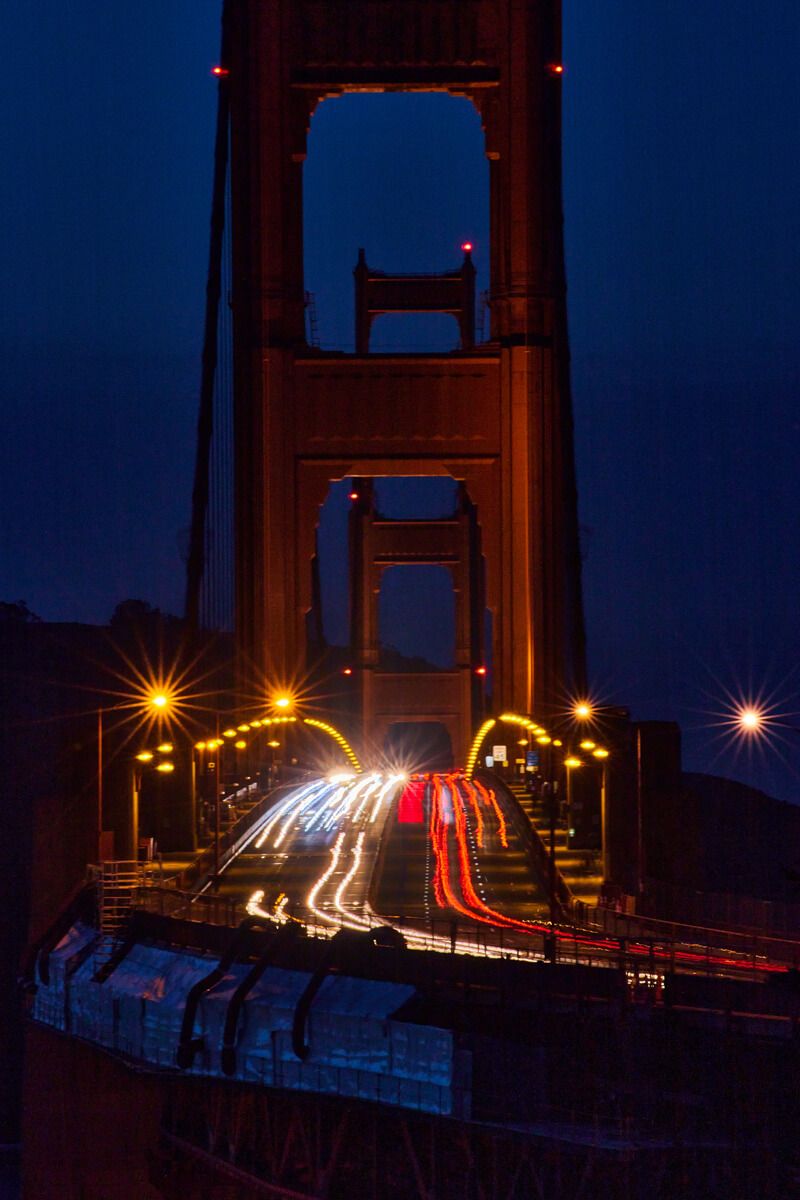 Bridge at night with car lights